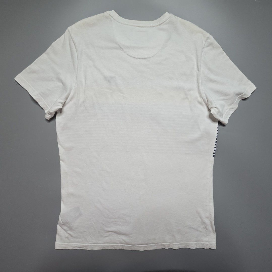 Barbour - Braeside Striped T-Shirt (Category: Tshirts & Polo Shirts ) located in Malabon City. Submitted by buynflex (Listing ID 1427470054, Image 2). Description: Braeside Striped Graphic T-Shirt Size M Dimes: W 20 x L 28 Used Good Condition Product Features Short sleeve Tailored fit Printed stripes to the front of the t-shirt Solid colour back Contrast Barbour and Shield embroidery to left chest 100% cotton 160gm Machine washable.