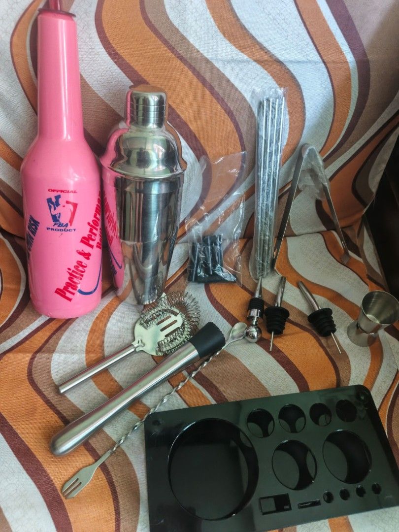 Bartending Tools Set with Flairing Bottle (Category: Other Kitchenware & Tableware) located in Manila. Submitted by _sellera (Listing ID 1427327304, Image 2). Description: Set Includes: 1 Flairing Bottle 1 Cocktail Shaker 4 pcs Stainless Steel Straw 2 pcs Pourer 1 pc Leakproof Bottle Stoppers 1 pc Bar Spoon 1 pc Muddler 1 pc Strainer 1 pc Jigger 1 pc Black Stand 1 pc Ice Tong - all stainless steel except for Flairing Bottle - flairing bottle has 