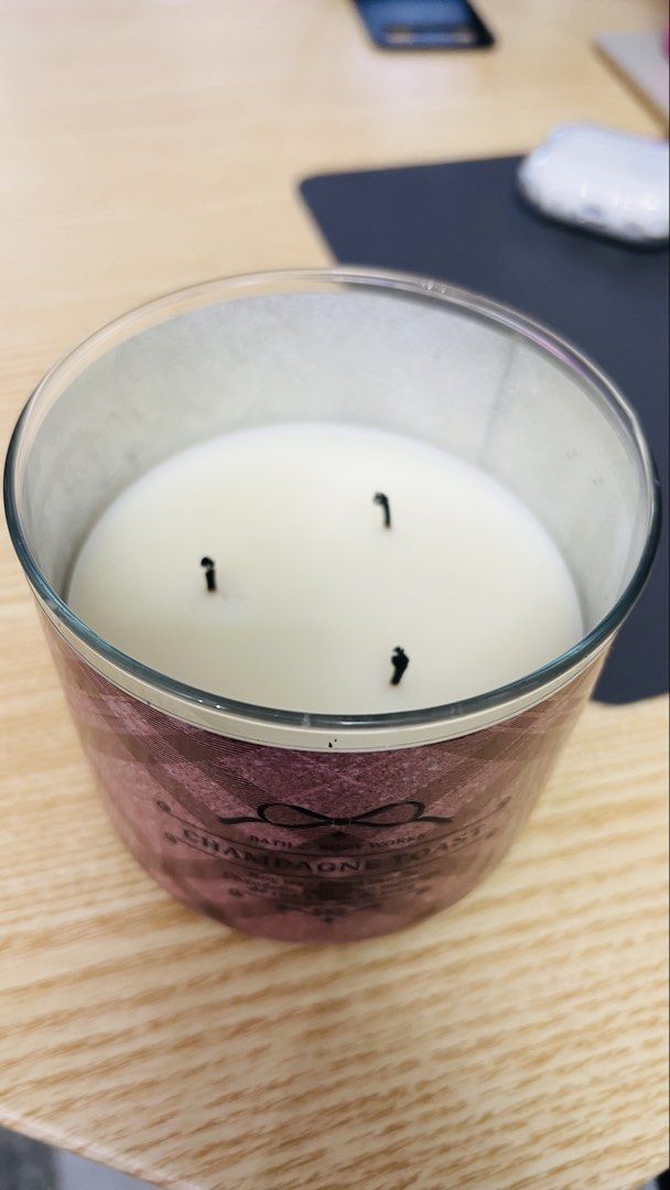 Bath & Body Works Champagne Toast Candle (Category: Home Fragrance) located in Tagaytay City. Submitted by lengleng13 (Listing ID 1427480700, Image 2). Description: Champagne toast 1/4 missing wax 3 wicked candle Bought in Bath and body works online Rfs: Declutter stuff.