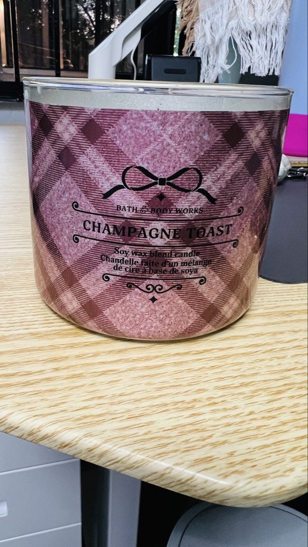 Bath & Body Works Champagne Toast Candle (Category: Home Fragrance) located in Tagaytay City. Submitted by lengleng13 (Listing ID 1427480700, Image 1). Description: Champagne toast 1/4 missing wax 3 wicked candle Bought in Bath and body works online Rfs: Declutter stuff.