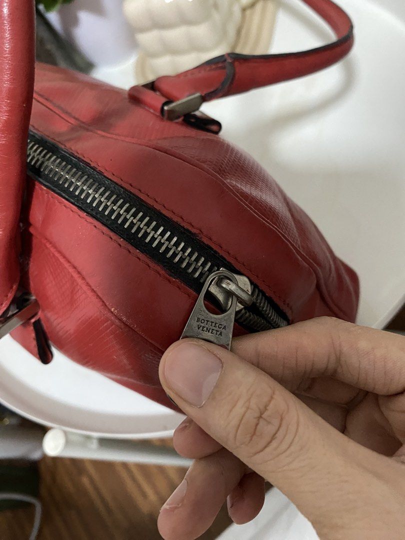 Authentic Bottega Veneta Shoulder Bag (Category: Luxury Bags & Wallets) located in Santa Rosa. Submitted by sassycollection. (Listing ID 1427348599, Image 3). Description: - Shoulder Bag style - Red color - with tags/code - excellent condition (genuine leather) - plated by its brand - no rubs / scratch - negotiable.