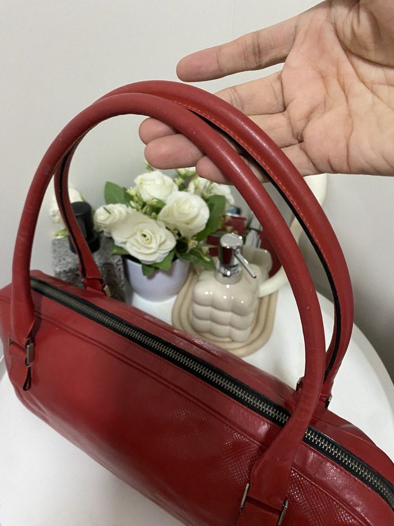 Authentic Bottega Veneta Shoulder Bag (Category: Luxury Bags & Wallets) located in Santa Rosa. Submitted by sassycollection. (Listing ID 1427348599, Image 2). Description: - Shoulder Bag style - Red color - with tags/code - excellent condition (genuine leather) - plated by its brand - no rubs / scratch - negotiable.
