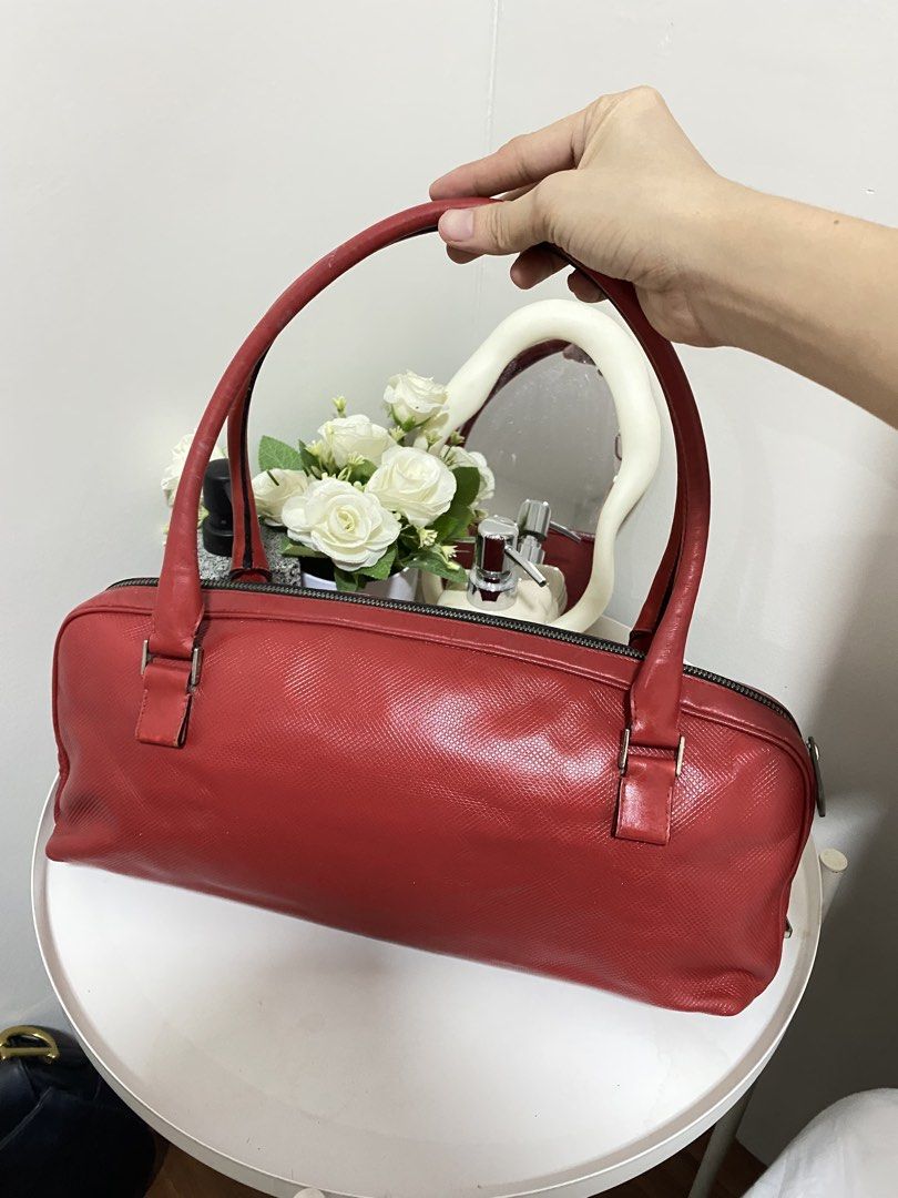 Authentic Bottega Veneta Shoulder Bag (Category: Luxury Bags & Wallets) located in Santa Rosa. Submitted by sassycollection. (Listing ID 1427348599, Image 1). Description: - Shoulder Bag style - Red color - with tags/code - excellent condition (genuine leather) - plated by its brand - no rubs / scratch - negotiable.