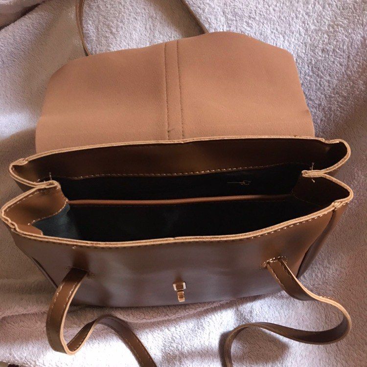 Brown Shoulder Bag (Category: Shoulder Bags) located in Marilao. Submitted by dnncsd (Listing ID 1427413138, Image 3). Description: Item Type: Shoulder Bag Main Material: Synthetic Leather Size: 25cm (L) x 9cm (W) x 21cm (H) Weight: 0.5kg Condition: No issue .