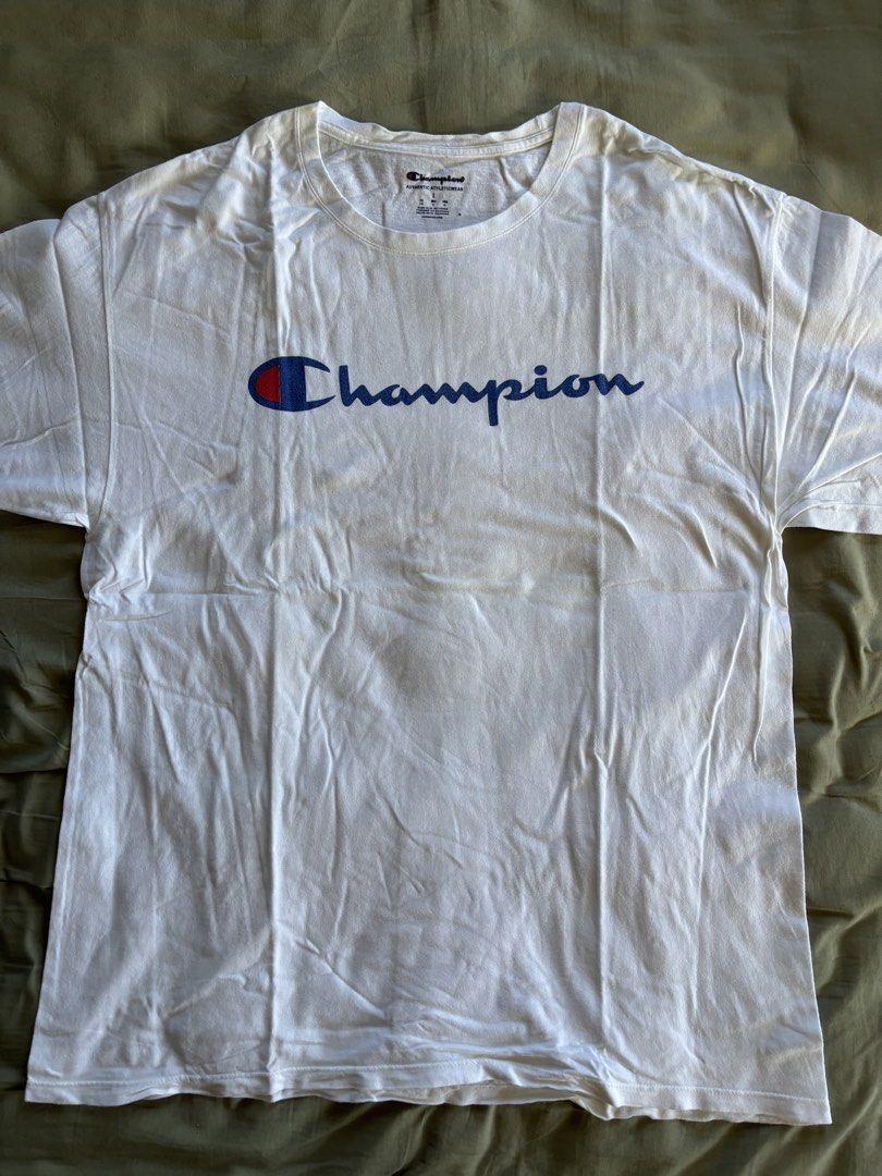 Champion T-shirts - White, Black (Category: Tshirts & Polo Shirts ) located in Los Banos. Submitted by declutterlistt (Listing ID 1427335989, Image 2). Description: All original and bought during trips. (1) White Logo L: 27 to 28 in W: 20 in Details: Thinner fabric (2) Black Logo L: 30 in W: 20 in Details: Thicker and boxier than White logo shirt (3) White Performance L: 27 to 28 in W: 20 in Details: Drifit material RFS: not wearing anymore cause