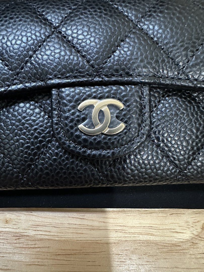 Chanel Classic Flap Card Holder (Category: Luxury Bags & Wallets) located in Cebu City. Submitted by cebucitybased (Listing ID 1427391089, Image 3). Description: Chanel Flap card holder Black caviar with gold hardware Comes complete Includes original box, dust bag, copy of receipt, chanel paper bag Flaw: Stained Ribbon (Last Pic) Bought from a reputable IG seller Stylish and compact RFS: Too small for my daily use I want a bigger wallet. I will s