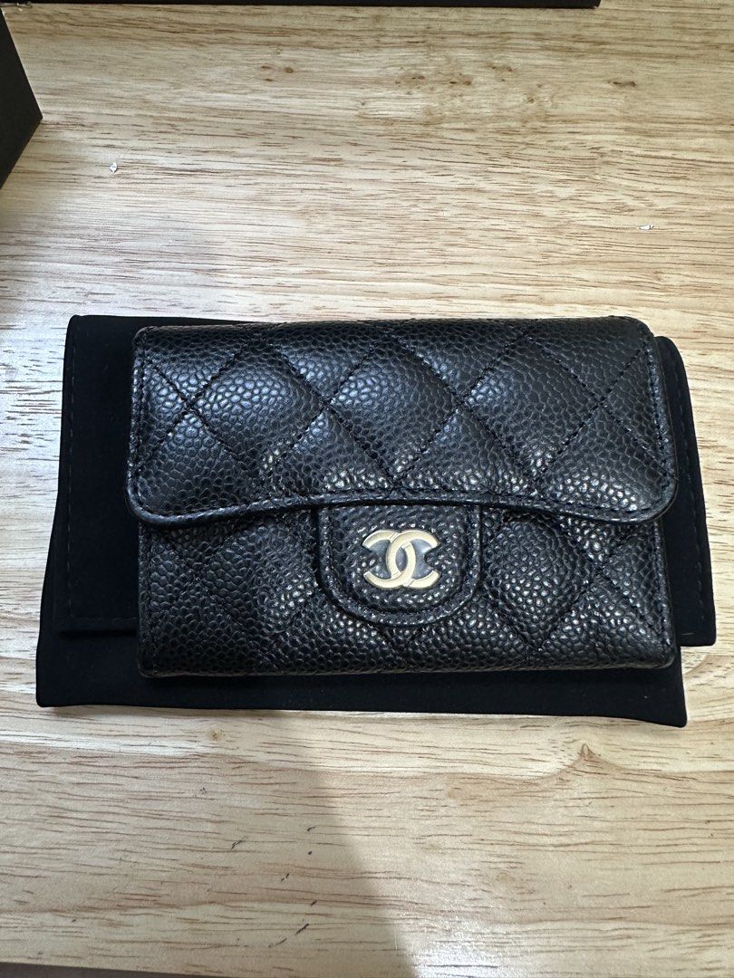 Chanel Classic Flap Card Holder (Category: Luxury Bags & Wallets) located in Cebu City. Submitted by cebucitybased (Listing ID 1427391089, Image 2). Description: Chanel Flap card holder Black caviar with gold hardware Comes complete Includes original box, dust bag, copy of receipt, chanel paper bag Flaw: Stained Ribbon (Last Pic) Bought from a reputable IG seller Stylish and compact RFS: Too small for my daily use I want a bigger wallet. I will s