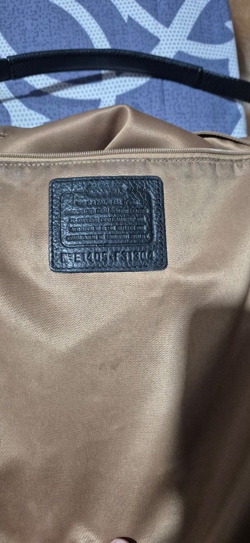 Coach Black and Brown Leather Handbag (Category: Luxury Bags & Wallets) located in Del Monte. Submitted by aabbuico (Listing ID 1427345294, Image 3). Description: preloved cowhead leather rs: decluttering.