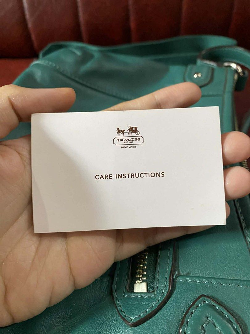 Coach Daisy spectator crossbody bag (Category: Luxury Bags & Wallets) located in Cavite. Submitted by rov26 (Listing ID 1427336665, Image 3). Description: Coach Daisy spectator crossbody bag with Adjustable and detachable strap included. Comes with original care card/guide Condition: Overall in good condition. The leather is still soft and well-maintained. There are some minor signs of wear, including small scuffs and marks on the bottom and corn