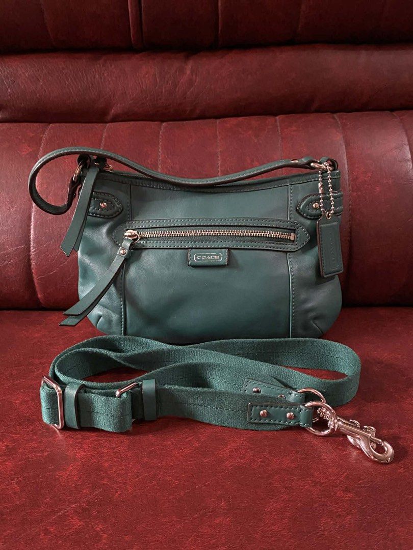 Coach Daisy spectator crossbody bag (Category: Luxury Bags & Wallets) located in Cavite. Submitted by rov26 (Listing ID 1427336665, Image 1). Description: Coach Daisy spectator crossbody bag with Adjustable and detachable strap included. Comes with original care card/guide Condition: Overall in good condition. The leather is still soft and well-maintained. There are some minor signs of wear, including small scuffs and marks on the bottom and corn