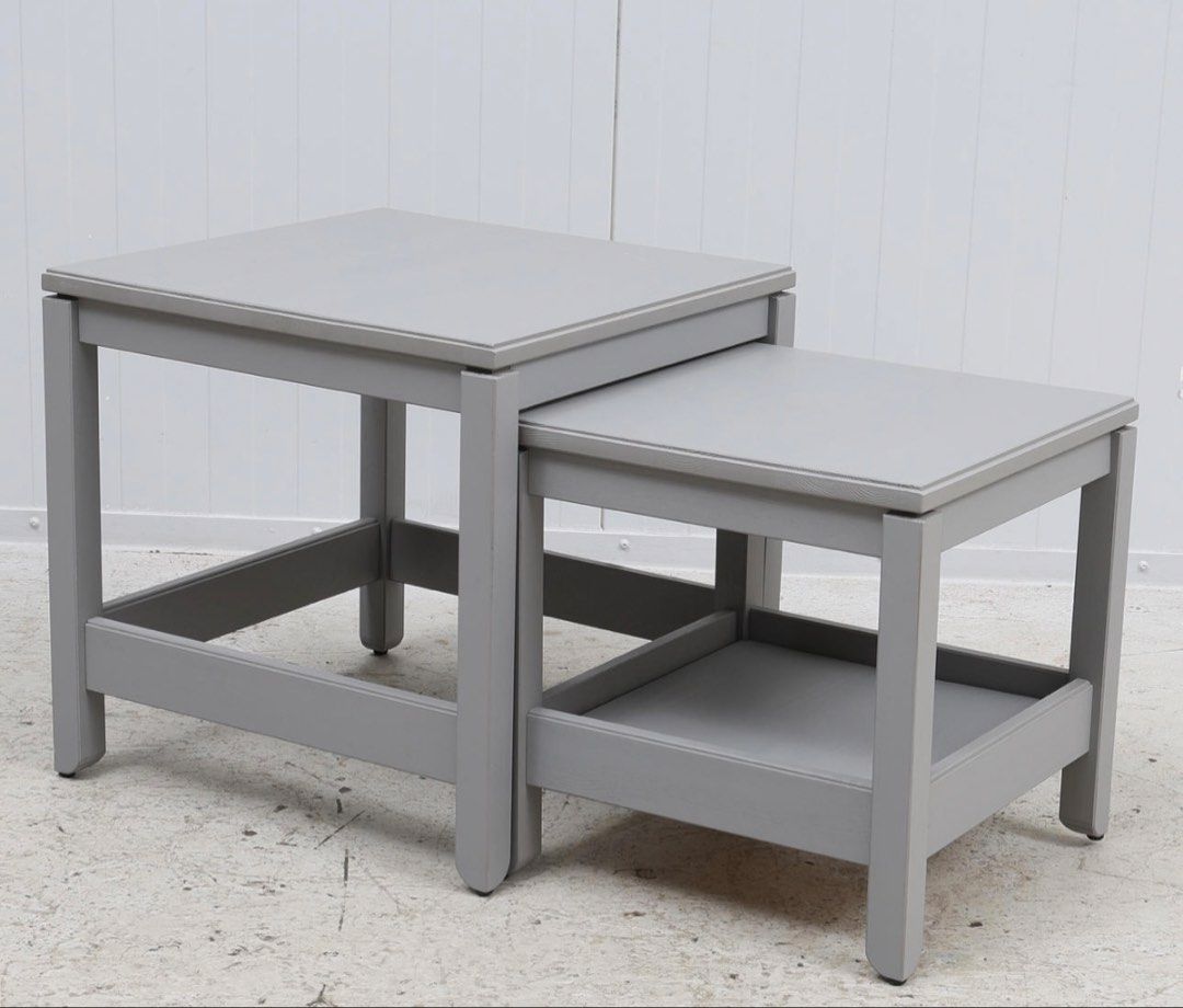 Coffee table IKEA Nesting Tables - Grey (Category: Tables & Sets) located in Singapore. Submitted by ashty (Listing ID 1427356947, Image 1). Description: Set of two IKEA nesting tables in grey. The larger table is 50cm x 50cm, and the smaller table is 42cm x 42cm. Perfect for small spaces or as side tables..