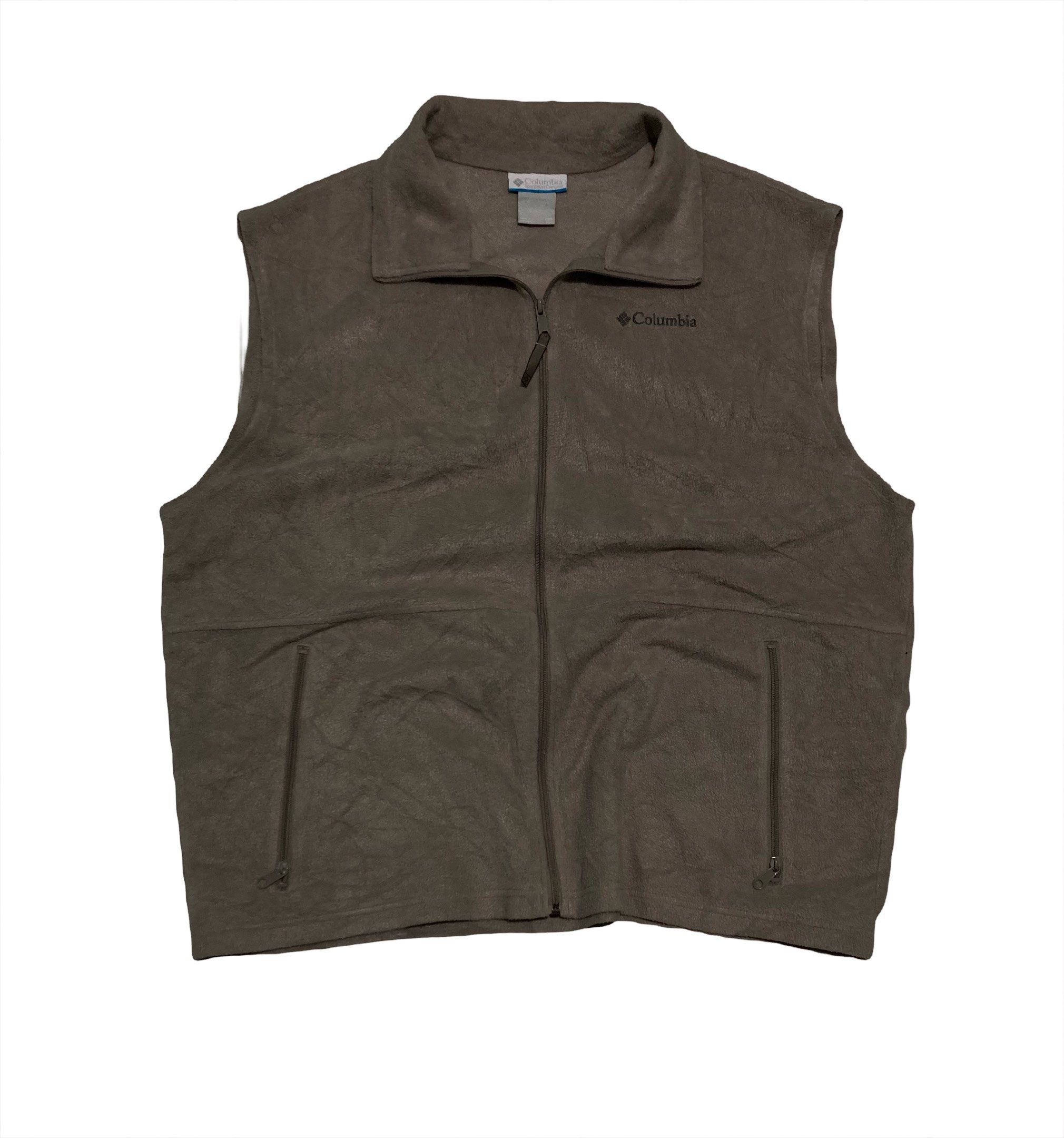 Columbia Fleece Vest (Category: Vests) located in Manila. Submitted by dacsjohnny (Listing ID 1427370115, Image 1). Description: Columbia fleece vest in a neutral color. Features a full zip closure, two front pockets, and the Columbia logo on the chest. The tag is visible in the image..