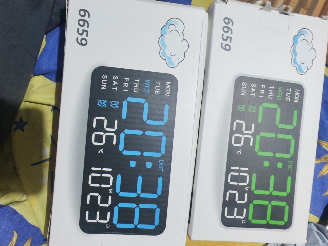 Digital Wall Clock (Category: Clocks) located in Muntinlupa City. Submitted by gdupalco (Listing ID 1427431380, Image 3). Description: Digital Wall Clock With Temperature Size : 21.5*11*3cm/8.5*4.3*1.1inch Power : Battery 3 x AAA USB 5v 1a Price : 200 per pcs 175 each for 2pcs and Up Available on hand 12pcs. Green and Blue With White Back and Blue With Black Back.