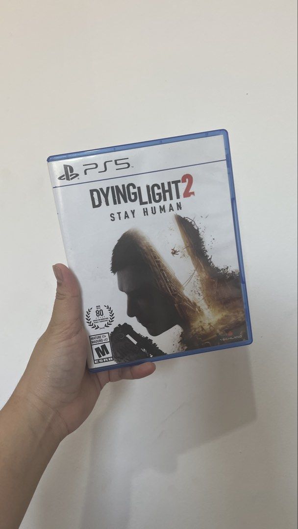Dying Light 2: Stay Human - PS5 (Category: PlayStation) located in Taguig. Submitted by beberotti (Listing ID 1427322783, Image 1). Description: Condition: Used - Excellent Platform: PlayStation 5 (PS5) Publisher: Techland Up for sale is a physical copy of Dying Light 2: Stay Human for the PS5. This is the official US/North American release (ESRB Rated M). Experience one of the best open-world parkour action-RPGs with upgraded visuals and perform