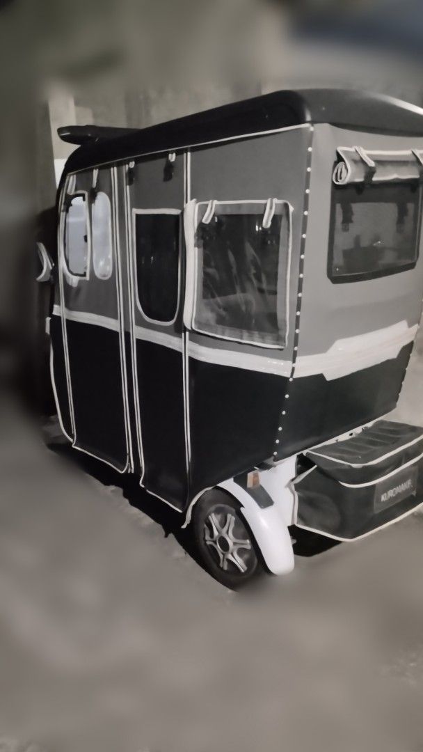 Electric Tricycle with Enclosed Cabin (Category: Motorbikes for Sale) located in Dasmarinas. Submitted by ofelia1220 (Listing ID 1427429498, Image 3). Description: EBIKE KUROMAKE 3 WHEELS FOR SALE EXCELLENT CONDITION NO ISSUES RAIN PROOF RUNNING SMOOTH WITH COMPARTMENT WITH BLUETOOTH SPEAKER MAKUNAT YUNG BATTERY MATAGAL MALOWBAT LADY OWNED KAYA HINDI LASPAG 60V/20AH Before 800 watts Upgrade to 1,500 watts All lights working Wiper Working Conditio