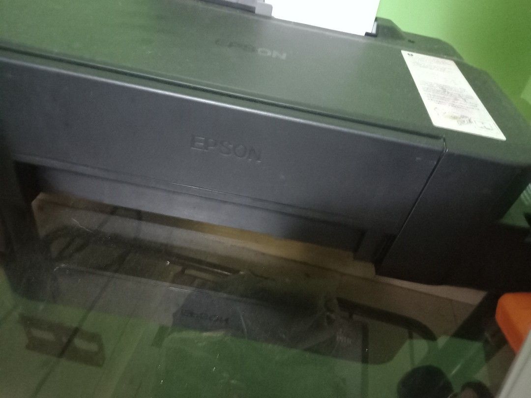 Epson Printer L120 (Category: Printers, Scanners & Copiers) located in Bulacan. Submitted by arkcal24 (Listing ID 1427347850, Image 1). Description: RFS: Declutter No damage.