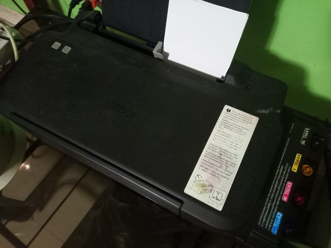 Epson Printer L120 (Category: Printers, Scanners & Copiers) located in Bulacan. Submitted by arkcal24 (Listing ID 1427347850, Image 2). Description: RFS: Declutter No damage.