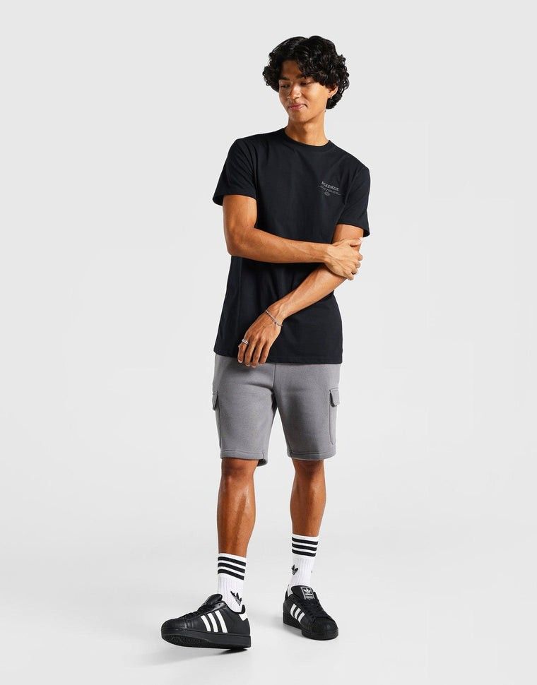 FREE SHIPPING NATIONWIDE McKenzie Black Graphic T-Shirt (Category: Tshirts & Polo Shirts ) located in Quezon City. Submitted by wcfhomeandoffice (Listing ID 1427431796, Image 2). Description: The McKenzie Aero T-Shirt Black is a clean and versatile staple, made from soft cotton for all-day comfort. Designed with a classic crew neckline and short sleeves, it’s finished with subtle McKenzie branding for a sleek everyday look that pairs effortlessly