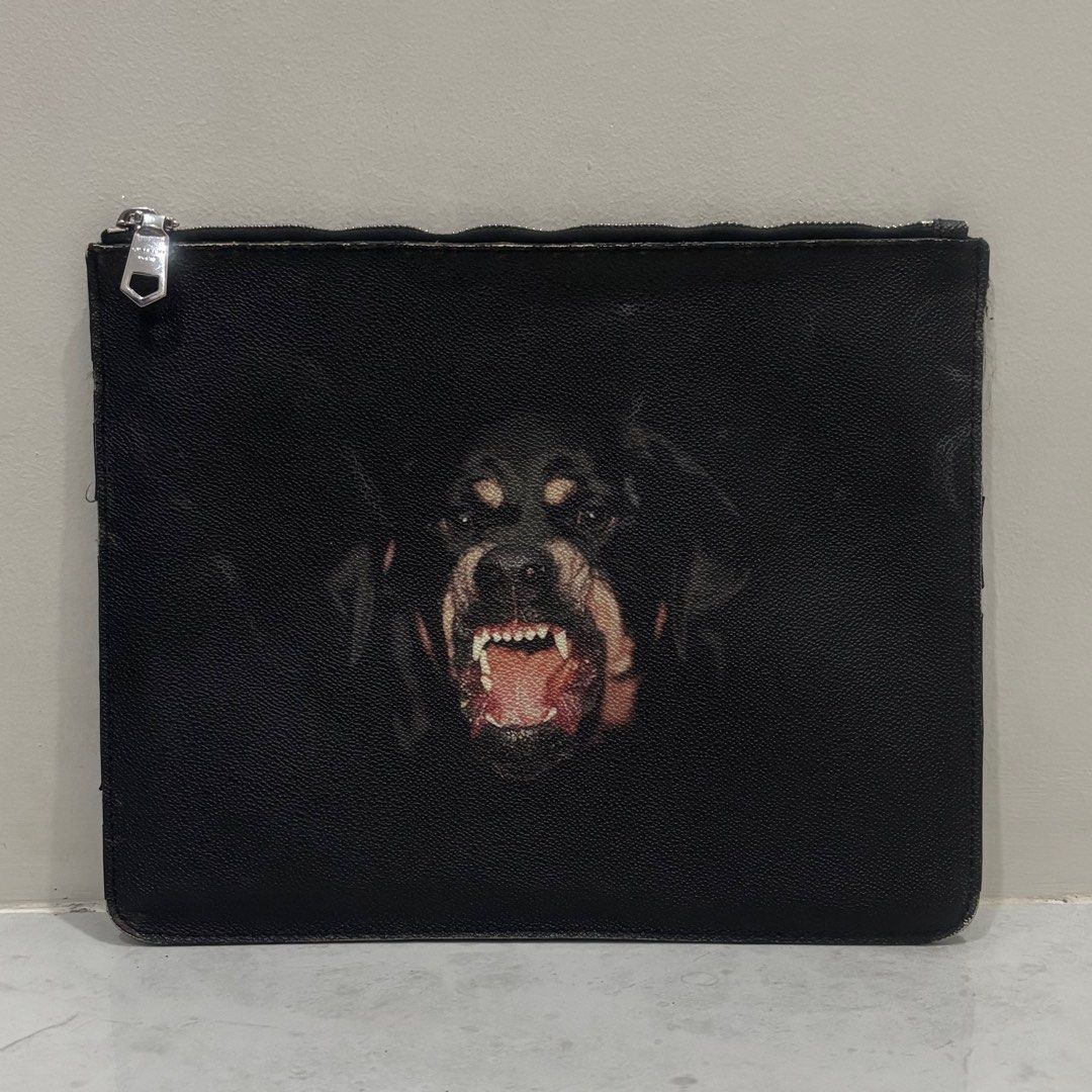 Givenchy rottweiler clutch bag (Category: Luxury Bags & Wallets) located in Cebu City. Submitted by florianmiral (Listing ID 1427427851, Image 1). Description: Givenchy rottweiler clutch bag Very good condition due to sign of usage Please check every photos.