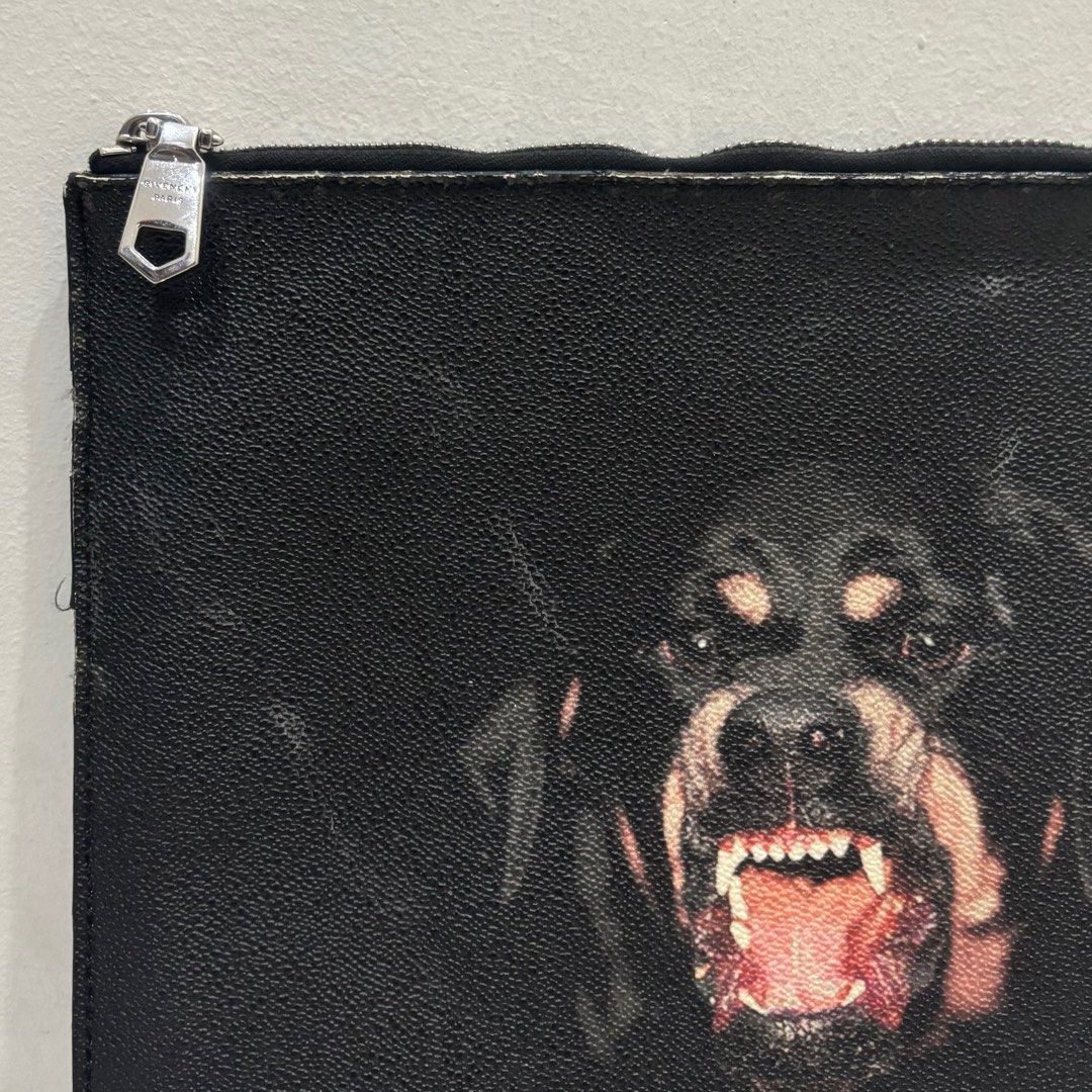 Givenchy rottweiler clutch bag (Category: Luxury Bags & Wallets) located in Cebu City. Submitted by florianmiral (Listing ID 1427427851, Image 2). Description: Givenchy rottweiler clutch bag Very good condition due to sign of usage Please check every photos.