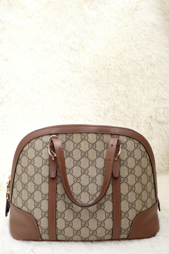 Gucci Dome Guaranteed Genuine (Category: Luxury Bags & Wallets) located in Mandaluyong City. Submitted by amps.ae (Listing ID 1427409733, Image 2). Description: Condition : 8.5/10 signs of use only but NO major flaw. Clean in and out Size : Medium (same size like Louis vuitton alma) Authenticity : Guaranteed genuine double money if fake .