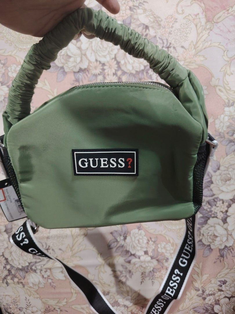 Guess Ace Top Handle Crossbody Olive (Category: Cross-body Bags) located in Quezon City. Submitted by G.E.M18 (Listing ID 1427399884, Image 1). Description: Guess Ace Top Handle Crossbody Olive. L 7"x H 5"x W 3".