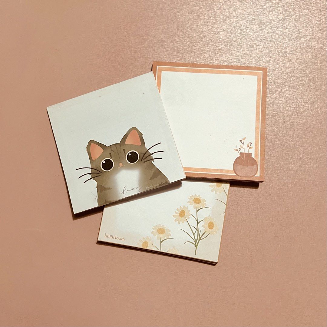 Hheirloom Assorted Memo Pad (3 pads) (Category: Stationery & School Supplies) located in Marikina City. Submitted by hheirloomstationery (Listing ID 1427413904, Image 1). Description: Size: 9cm X 9cm Pages per pad: 20 pages Thickness per sheet: 100gsm Set of three adorable memo pad featuring cat, daisy, and vase designs, originally designed by Hhëirloom. Perfect for jotting down notes, reminders, or adding a touch of cuteness to your workspace. E