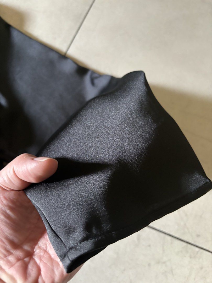 H&M Black Satin Blouse XL (Category: Blouses) located in Paranaque City. Submitted by caityprecky (Listing ID 1427483352, Image 3). Description: Black satin blouse from H&M. Features long, wide sleeves and a round neckline. The size is XL. The blouse has a keyhole opening at the back. Made of a smooth, shiny fabric. Perfect for a night out or a dressy occasion..