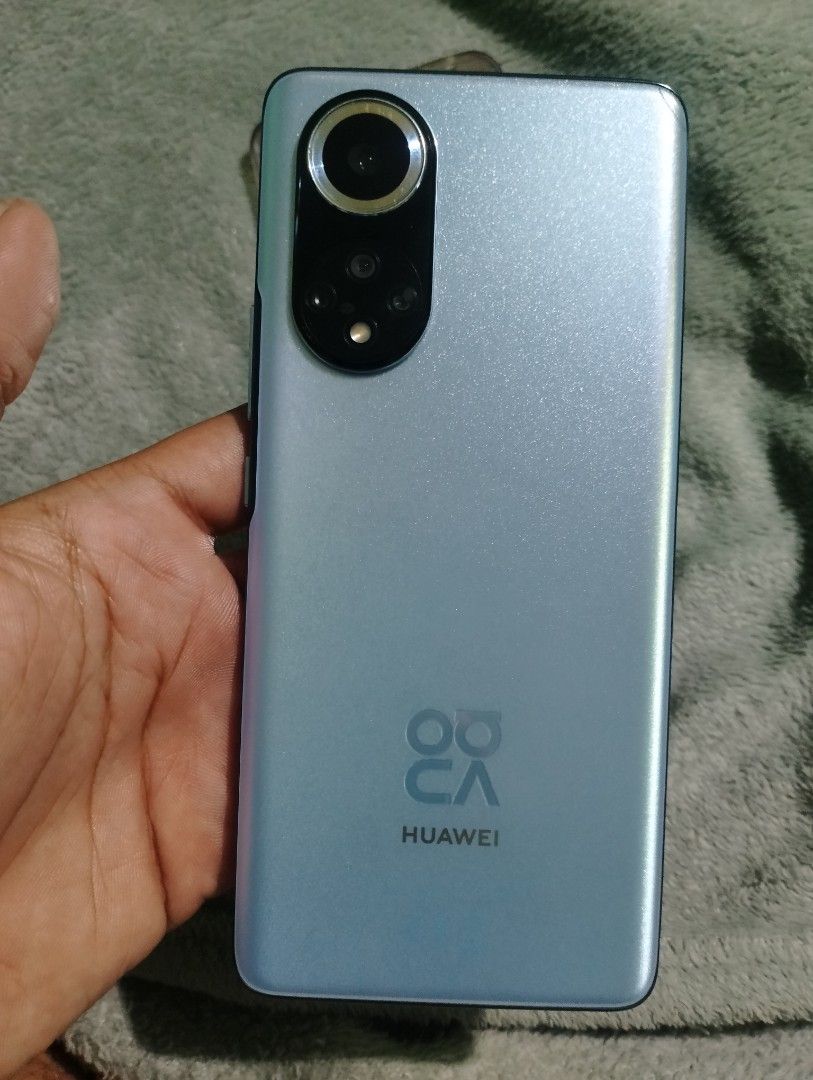 Huawei Nova 9 (Category: Huawei) located in Manila. Submitted by ppogi203216148 (Listing ID 1427389734, Image 3). Description: For SALE or SWAP Huawei Nova 9 ₱ 6,490 NEGOTIABLE 120Hz refresh rate 8/256GB OLED Curve Display Issue: maliit na line sa back glass and 1dent Inclusion: Unit, Case and Rep charger.
