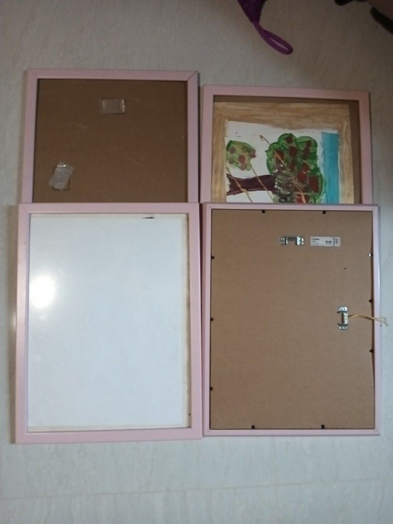 IKEA plastic frames (Category: Frames & Pictures) located in Singapore. Submitted by joycechian93211 (Listing ID 1427394370, Image 1). Description: - IKEA FISKBO plastic frames - Pink plastic - Suitable for artwork on drawing block 30x40 cm - can be hung portrait or landscape - Take all for $5 - Meetup locations: Sengkang or Punggol.