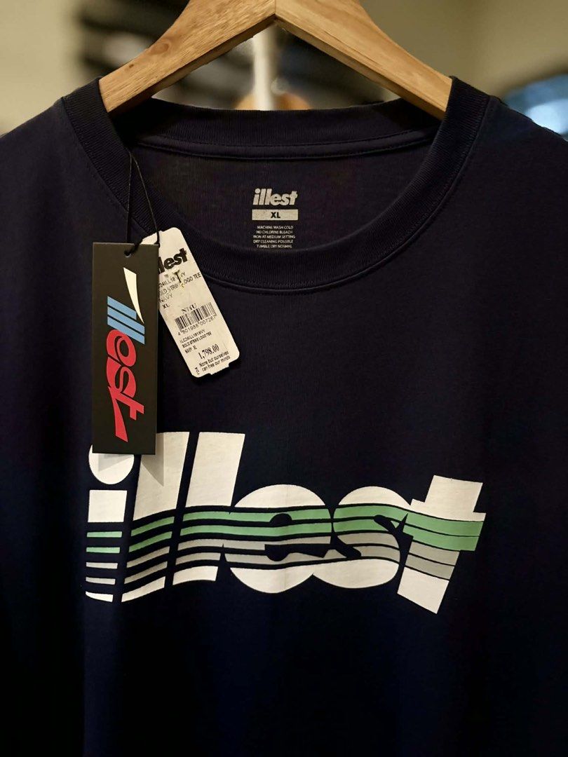 Illest Navy Blue Graphic Tee XL (Category: Tshirts & Polo Shirts ) located in Pasig City. Submitted by sneakeasy (Listing ID 1427324070, Image 2). Description: For Sale Bnew Legit Srp Bnew illest shirt Dark Navy blue color Sizes Large Dimes(22.5 x 30.5)fit to Large to XL frame XL Dimes(23.5 x 32)fit to XL to XXL frame Location Pasig.