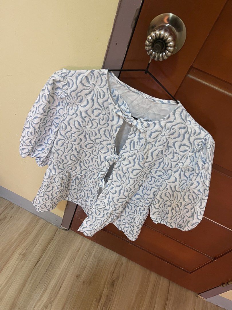 Lace up front Puff Sleeve Peplum Top (Category: Blouses) located in Baler. Submitted by declutterwithrhys (Listing ID 1427389406, Image 3). Description: FOR SALE (PLEASE MAKE READING A HABIT) LACE UP FRONT PUFF SLEEVE CREW NECK LOOSE FIT RUFFLE HEM PEPLUM TOP COLOR BLUE BRAND NEW CONDITION SIZE EXTRA SMALL ON TAG DIMES 19 X 22 INCHES BEST FIT SIZE SMALL TO MEDIUM BODY FRAME RFS. TOO SMALL FOR ME KINDLY CHECK THE PHOTOS FOR THE COMPLETE DETAILS CO