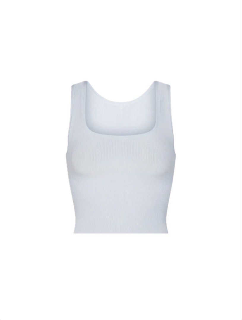 Light blue skims ribbed tank top (Category: Others Tops) located in Manila. Submitted by neeedtooodecluttterrr (Listing ID 1427318614, Image 1). Description: Light blue skims ribbed tank top, bought for P1,800, very comfy and no problems at all!! (Reason for selling: not really my color 🤭).