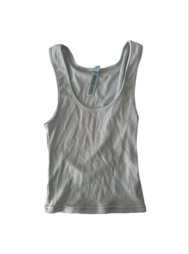 Light blue skims ribbed tank top (Category: Others Tops) located in Manila. Submitted by neeedtooodecluttterrr (Listing ID 1427318614, Image 3). Description: Light blue skims ribbed tank top, bought for P1,800, very comfy and no problems at all!! (Reason for selling: not really my color 🤭).