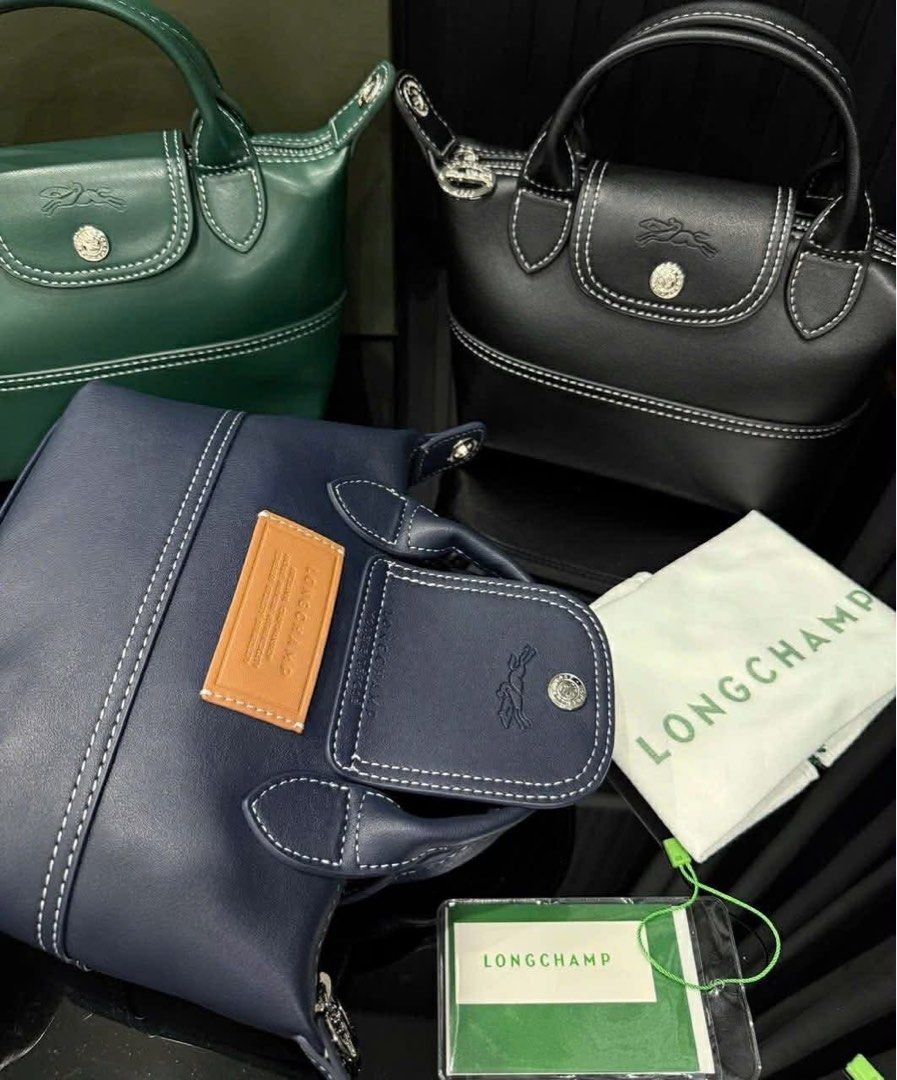 Longchamp Le Pliage Xtra XS Handbag with strap Cowhide leather (Category: Luxury Bags & Wallets) located in Pasig City. Submitted by lace_89 (Listing ID 1427358421, Image 2). Description: Brand new Longchamp Le Pliage Xtra XS Handbag with strap Cowhide leather in black and navy blue With box and cloth bag ₱10,499.