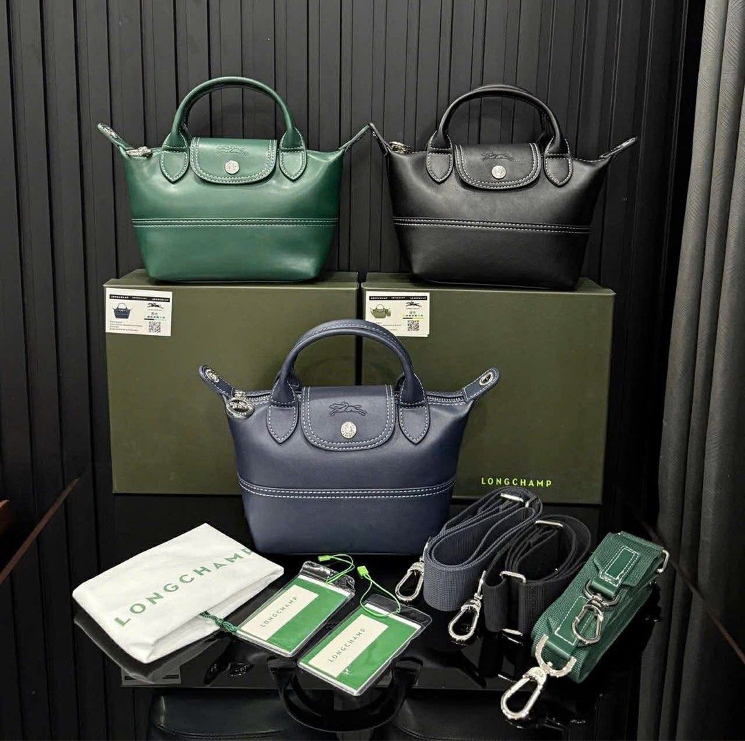 Longchamp Le Pliage Xtra XS Handbag with strap Cowhide leather (Category: Luxury Bags & Wallets) located in Pasig City. Submitted by lace_89 (Listing ID 1427358421, Image 1). Description: Brand new Longchamp Le Pliage Xtra XS Handbag with strap Cowhide leather in black and navy blue With box and cloth bag ₱10,499.