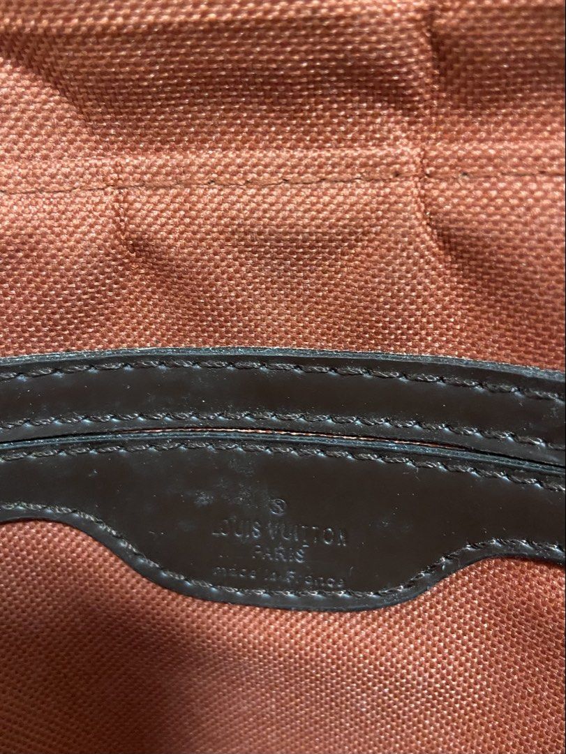 Louis Vuitton Damier Ebene Messenger Bag (Category: Luxury Bags & Wallets) located in Borongan. Submitted by thrivory.ph (Listing ID 1427374649, Image 2). Description: Authentic Louis Vuitton Damier Ebene messenger bag. Features the classic Damier Ebene canvas with a brown leather strap. The interior has a brown textile lining. Includes a leather tag with the Louis Vuitton Paris logo and a date code AE6688. Made in France..