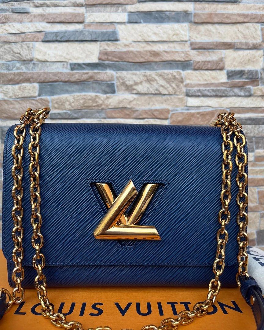 Louis Vuitton Epi Twist MM (Category: Luxury Bags & Wallets) located in Cavite. Submitted by justbrowsing_decluttering (Listing ID 1427384283, Image 2). Description: Shoulder | Crossbody Size: Medium/MM Color: Navy Blue with Gold Hardware Details: Locally Bought PH Bought in Greenbelt With Receipt [Colors may vary due to lighting. Bags are Preowned so it will Not be Perfect; Unless stated new.] Guaranteed Authentic💯 Condition: 9/10 Rank A.