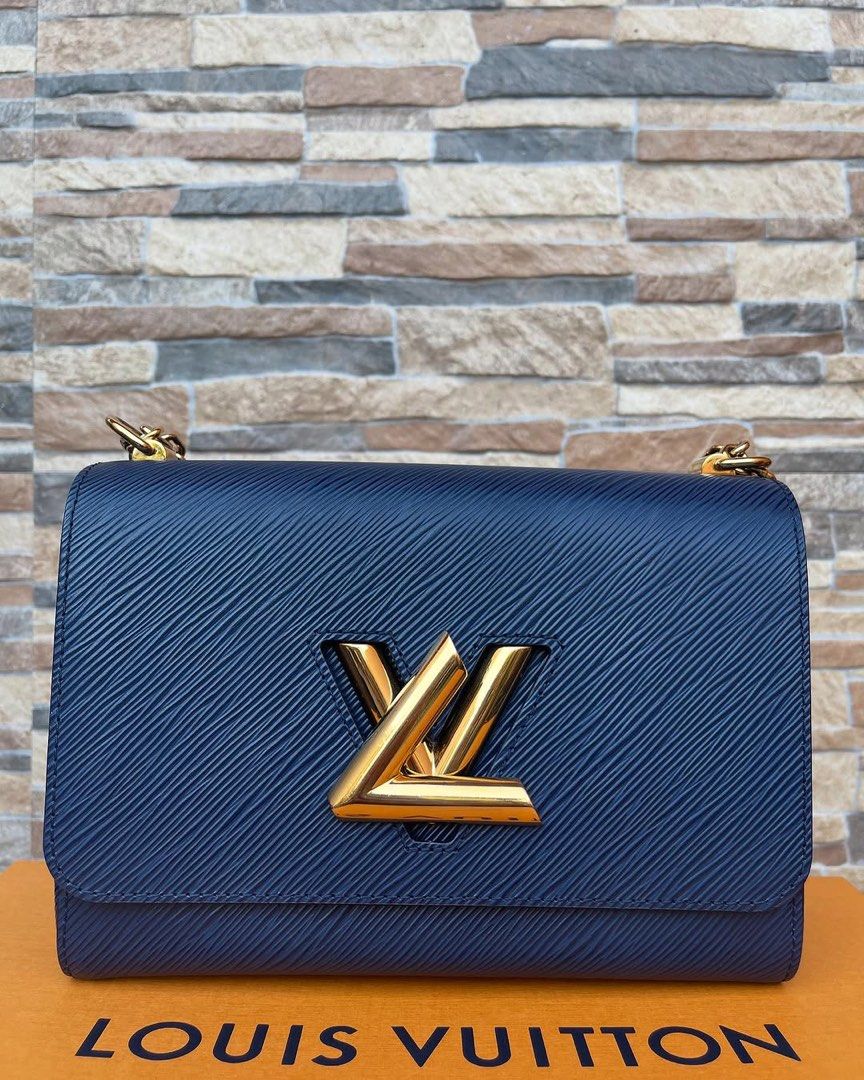 Louis Vuitton Epi Twist MM (Category: Luxury Bags & Wallets) located in Cavite. Submitted by justbrowsing_decluttering (Listing ID 1427384283, Image 3). Description: Shoulder | Crossbody Size: Medium/MM Color: Navy Blue with Gold Hardware Details: Locally Bought PH Bought in Greenbelt With Receipt [Colors may vary due to lighting. Bags are Preowned so it will Not be Perfect; Unless stated new.] Guaranteed Authentic💯 Condition: 9/10 Rank A.