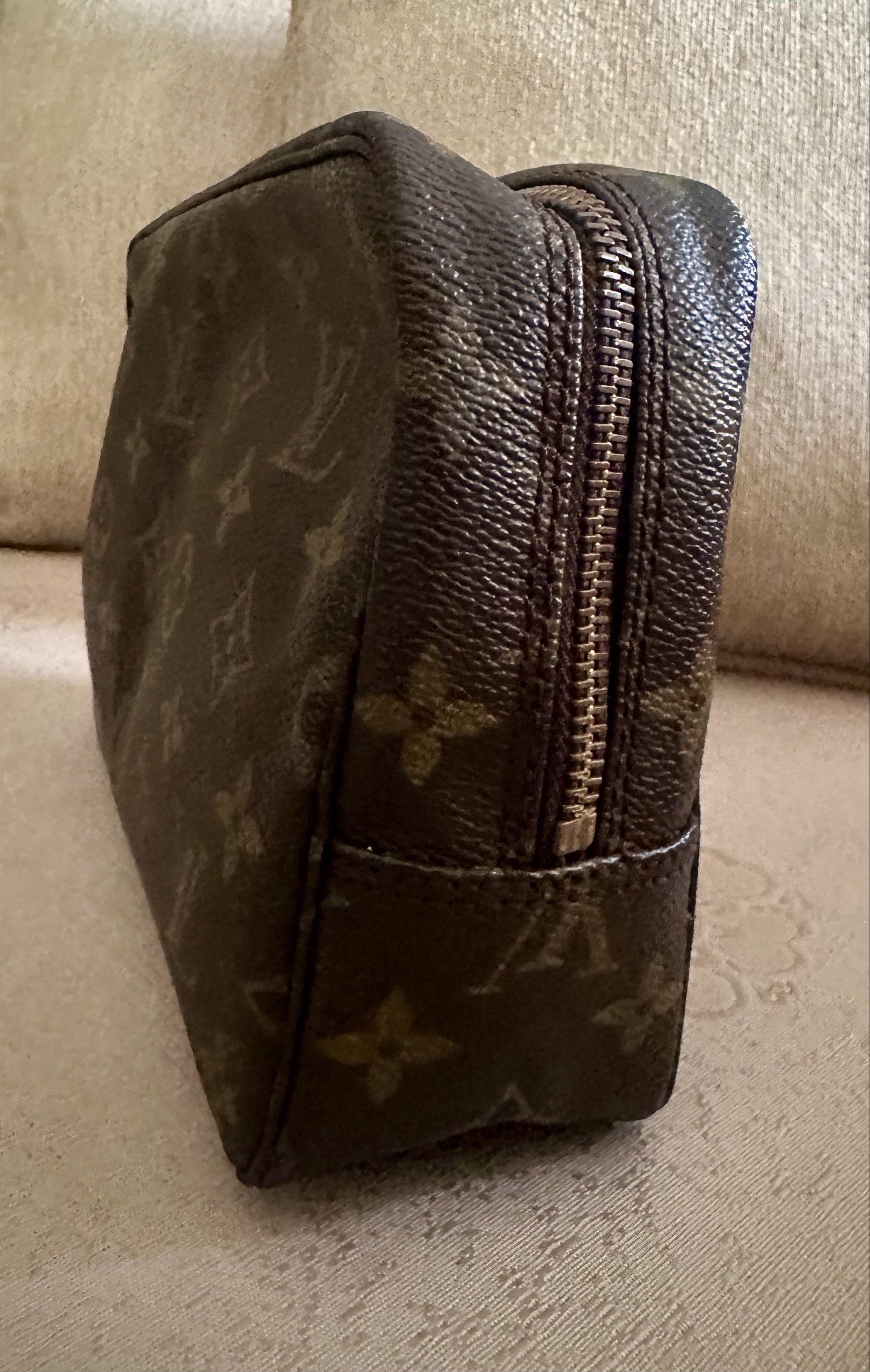 Louis Vuitton Toiletry Pouch (Category: Luxury Bags & Wallets) located in Quezon City. Submitted by armieesq (Listing ID 1427365160, Image 3). Description: Louis Vuitton Pre-Owned Monogram Trousse Toilette clutch bag Made in France monogram canvas body • top zip closure • interior slip pocket • brown • Serial Number: 874 TH • This item has no inclusions except for provided dust bag. • Condition: EXCELLENT w/ minimal zipper tarnish. Measurements: 