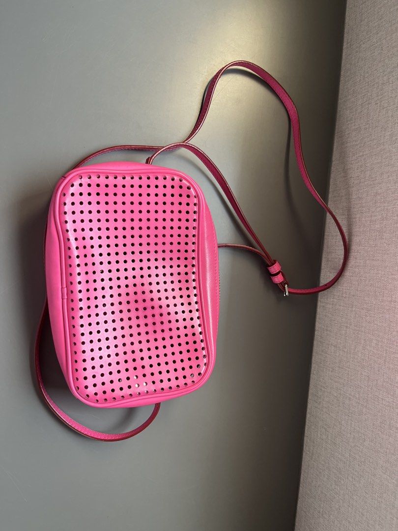 Marc by Marc Jacobs Perforated Crossbody Bag (Category: Luxury Bags & Wallets) located in Quezon City. Submitted by deesea (Listing ID 1427365023, Image 3). Description: Marc Jacobs Pink Crossbody Bag Leather Lightly used, well taken cared off .