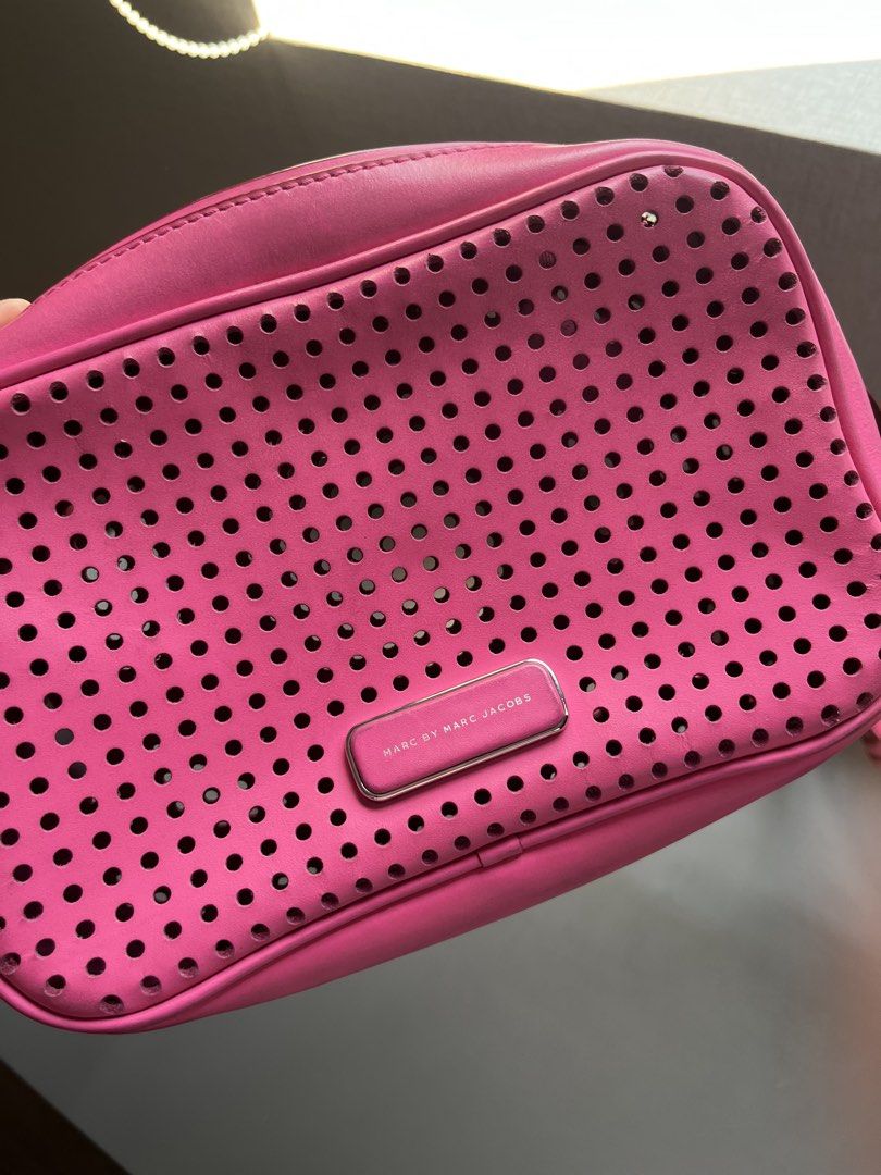 Marc by Marc Jacobs Perforated Crossbody Bag (Category: Luxury Bags & Wallets) located in Quezon City. Submitted by deesea (Listing ID 1427365023, Image 2). Description: Marc Jacobs Pink Crossbody Bag Leather Lightly used, well taken cared off .
