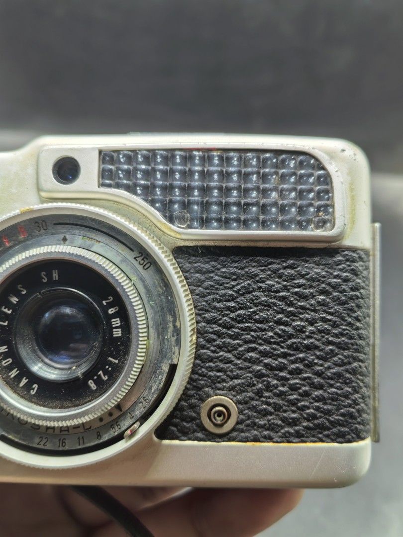 Mechanical Camera - Canon Demi (Category: Cameras) located in Cebu City. Submitted by dudes_villanueva (Listing ID 1427324761, Image 3). Description: Canon Demi - Mechanical Camera Note: Tested Functional‼️‼️‼️ All sales final and non-refundable. Condition: Shutter working. Film lever working. Viewfinder blurry needs cleaning. Seal expired. 📌A 35mm half-frame film camera launched in 1963. 📌Design: It features a slim, pocket-sized aluminum body 