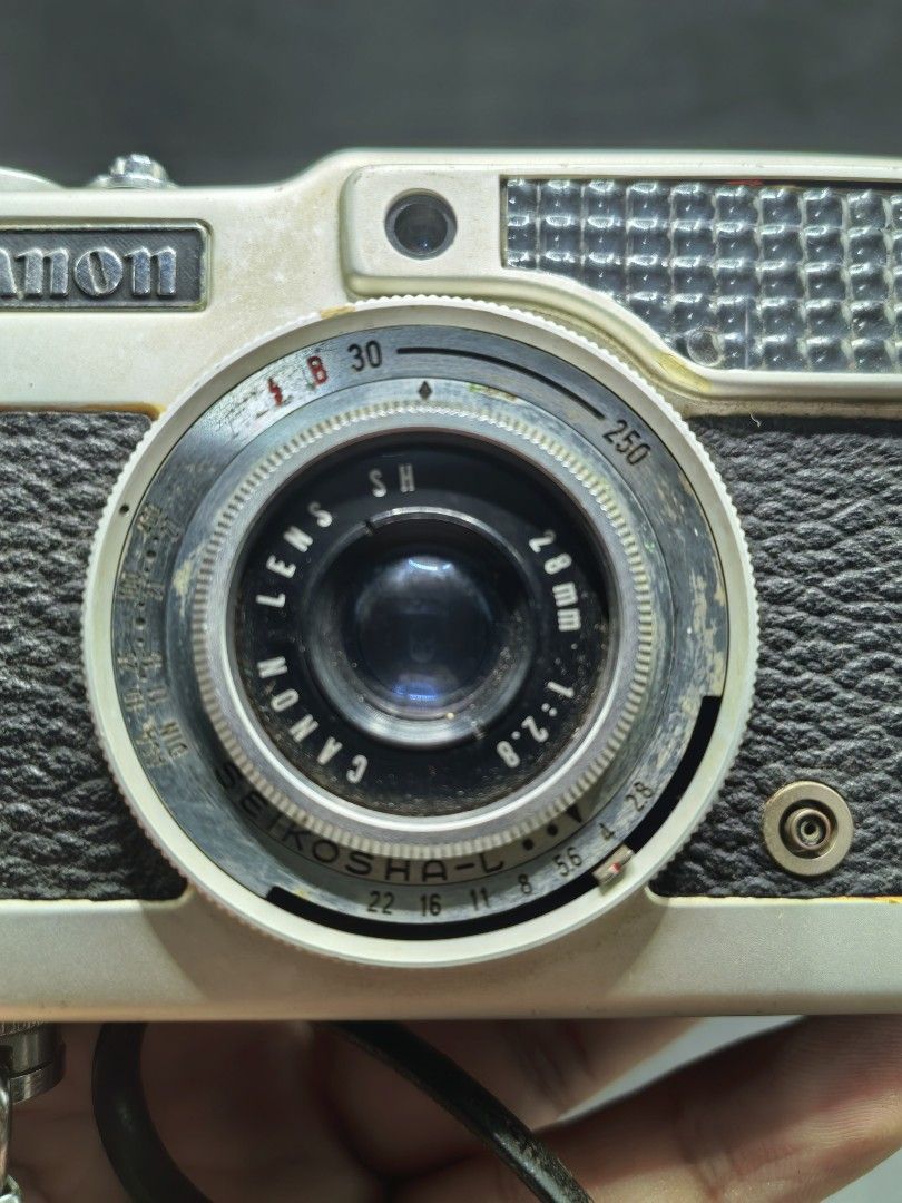 Mechanical Camera - Canon Demi (Category: Cameras) located in Cebu City. Submitted by dudes_villanueva (Listing ID 1427324761, Image 2). Description: Canon Demi - Mechanical Camera Note: Tested Functional‼️‼️‼️ All sales final and non-refundable. Condition: Shutter working. Film lever working. Viewfinder blurry needs cleaning. Seal expired. 📌A 35mm half-frame film camera launched in 1963. 📌Design: It features a slim, pocket-sized aluminum body 
