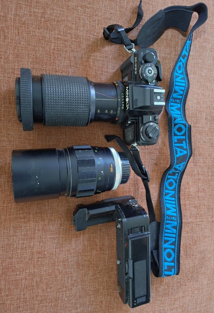 Minolta X-700 SLR Camera with Lenses, Flash & High Speed Shutter (Category: Cameras) located in Caloocan City. Submitted by riceman66445 (Listing ID 1427485147, Image 1). Description: Letting go of one of my treasured possession. This fully functional Vintage Minolta X-700 SLR film camera is a flagship camera of Minolta and one of its greatest milestone. It comes with two lenses and a flash. Includes a Minolta lens and a Tokina lens. The flash is