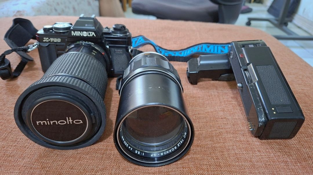 Minolta X-700 SLR Camera with Lenses, Flash & High Speed Shutter (Category: Cameras) located in Caloocan City. Submitted by riceman66445 (Listing ID 1427485147, Image 2). Description: Letting go of one of my treasured possession. This fully functional Vintage Minolta X-700 SLR film camera is a flagship camera of Minolta and one of its greatest milestone. It comes with two lenses and a flash. Includes a Minolta lens and a Tokina lens. The flash is