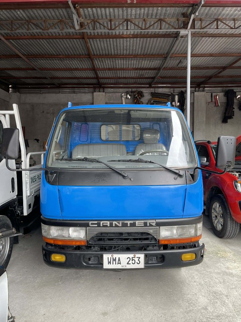 Mitsubishi Canter Canter Manual (Category: Used Cars) located in Marikina City. Submitted by traviz_ (Listing ID 1427331044, Image 3). Description: Mitsubishi Canter 12ft Dropside Doubletire Price : 430,000 Make : Mitsubishi Series : Canter Body : Dropside (12ft Double Tire) Color : Blue Year : 2000 Fuel : Diesel Engine : 4D32 Gross WT : 3800 (No truck ban) Other info: -bago upholstery -Leaf Spring (MOLYE) Front and Rear -Spare tire with jack and