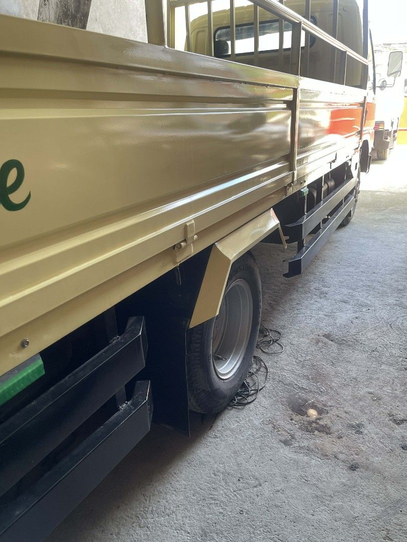Mitsubishi Canter Truck (Category: Heavy Vehicles) located in Marikina City. Submitted by traviz_ (Listing ID 1427331019, Image 2). Description: 2011 Mitsubishi Canter Mitsubishi Canter Wide dropside Price : 450,000 Negotiable Make : Mitsubishi Series : Canter Body : Dropside (14ft Double Tire) Double Wall body Color : Yellow and Blue Year : 2011 (1998 sa japan) Fuel : Diesel Engine : 4D33 Gross WT : 4200 Other info: -Surplus Japan pero nagamit n