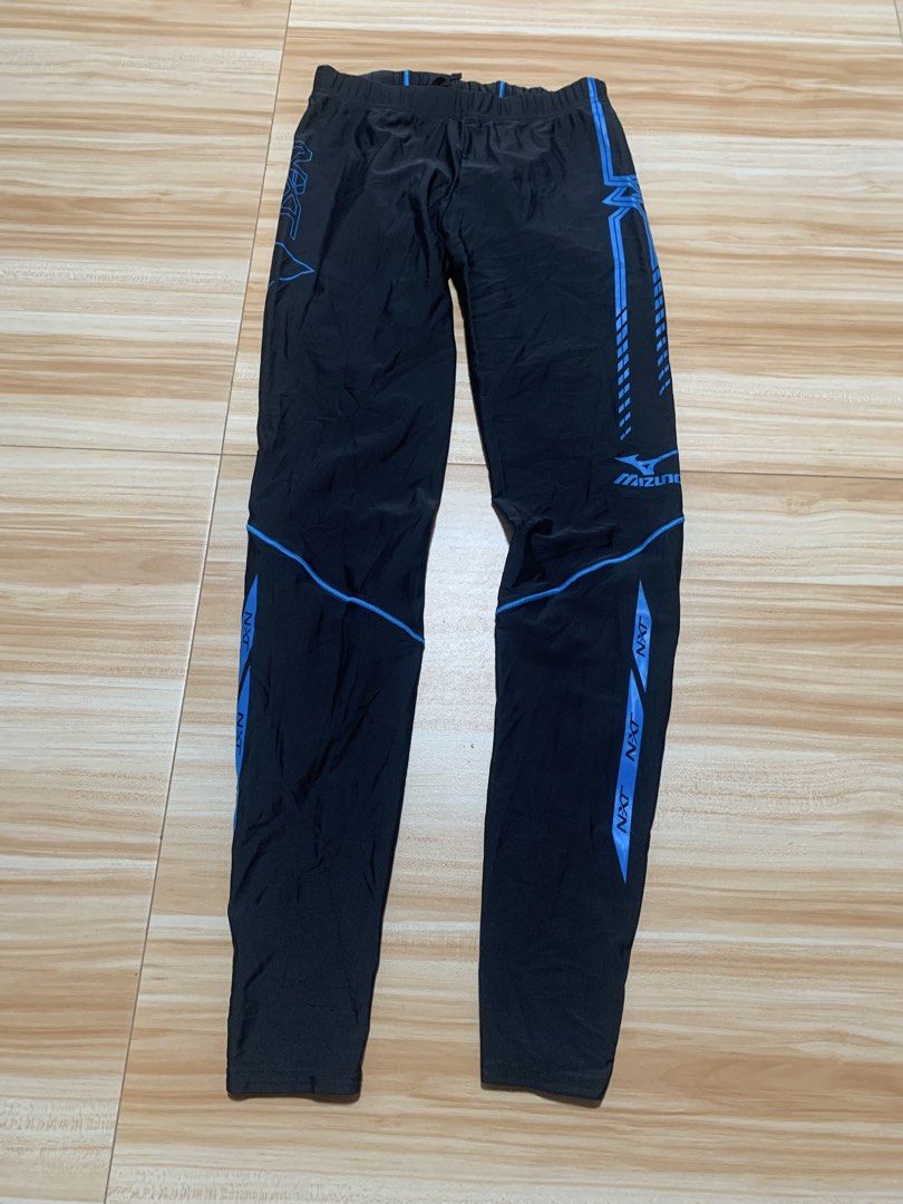 Mizuno Black Training Pants - Size L (Category: Other Bottoms) located in Calasiao. Submitted by beardmodefinds0707 (Listing ID 1427320152, Image 1). Description: Mizuno training pants in black with blue accents. Features the Mizuno logo and "NXT" branding. Includes zippers at the ankles and a drawstring waist. Made in Thailand. Size L. The tag indicates the pants are suitable for individuals with a height of 170-180 cm and a waist size of 85 cm.