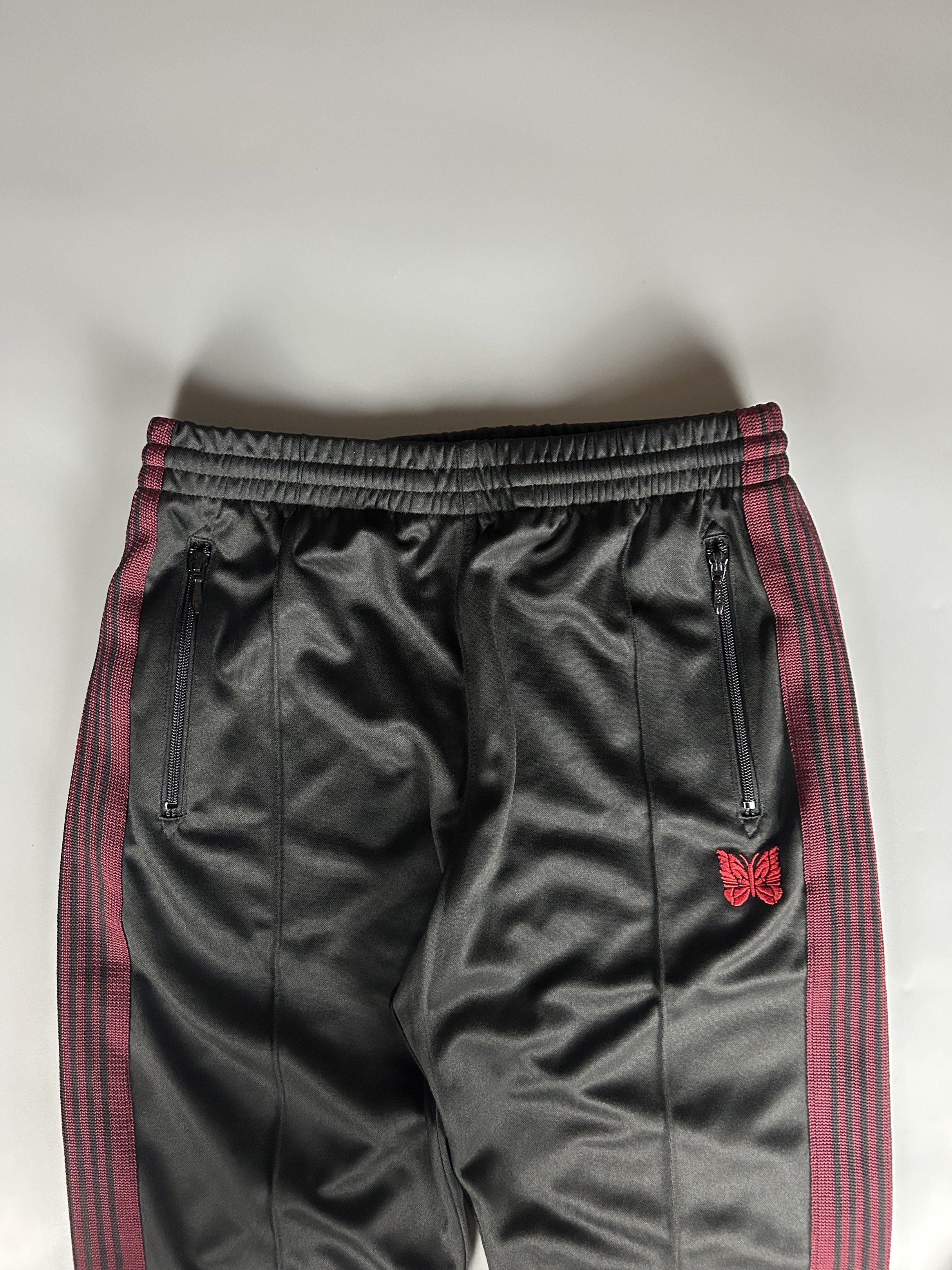 Needles Track Pants (Category: Joggers) located in Manila. Submitted by 3rdealz (Listing ID 1427320824, Image 2). Description: Needles Size M In good condition Courier: J&T or Lalamove Item will be posted by express shipping (J&T) with good tracking record in 1-3 business days after received cleared payment. Expect it to reach you in 3-7 business days only after item been shipped. Please check my other listings and take advantage of combine shipp